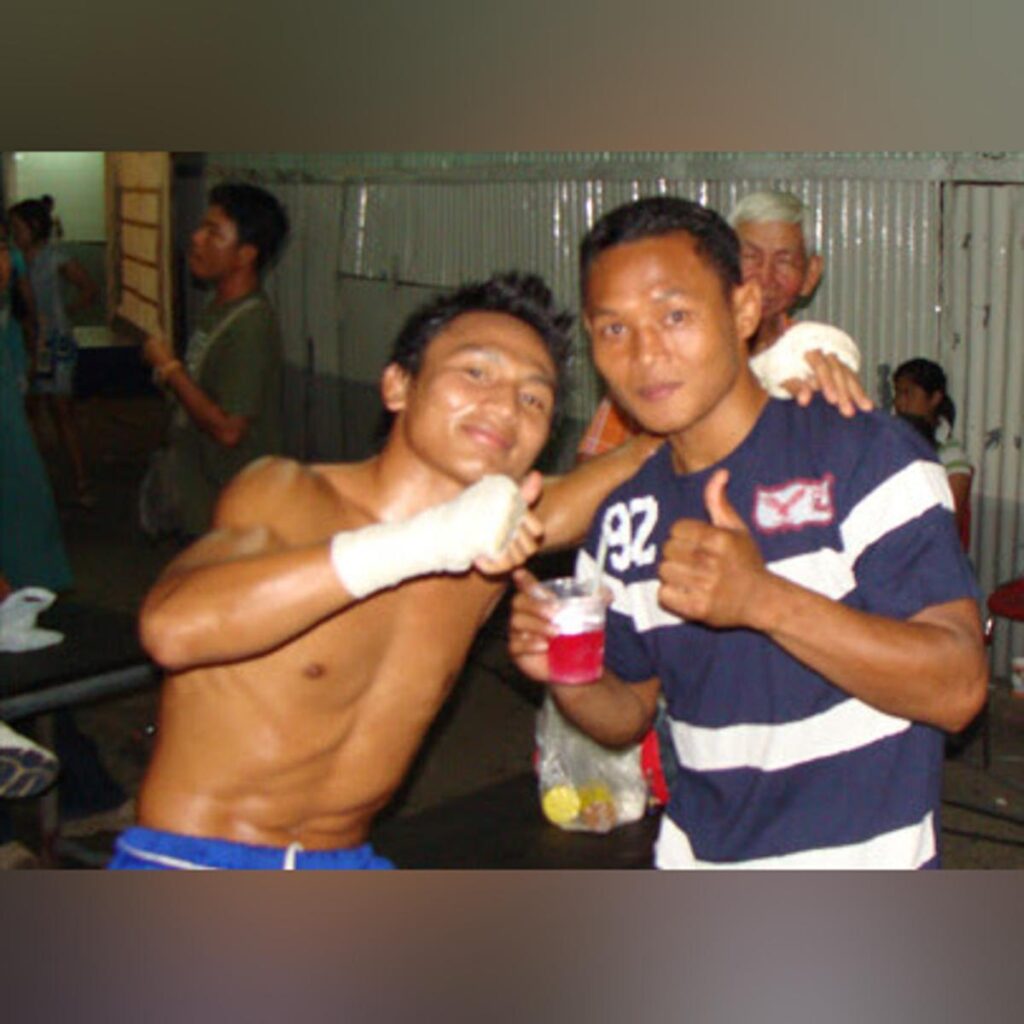 Lerdsila Chumpairtour and Saenchai Sor. Kingstar share a moment backstage before a fight