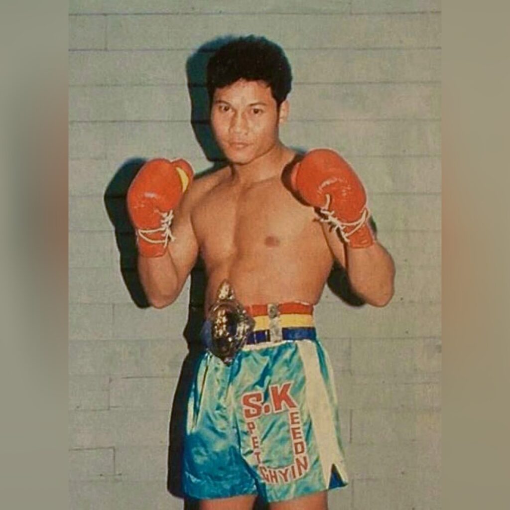 Sakad Petchyindee with the Rajadamnern Stadium Light Welterweight (140 lbs) championship belt, won by knocking out Somsong Kiattoranee in the third round on July 30th, 1984.